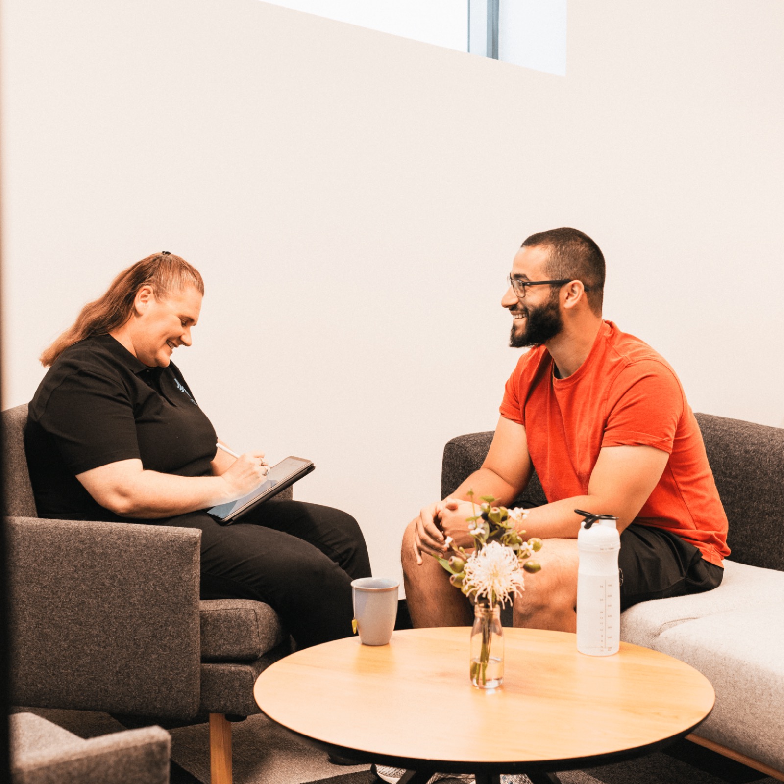 Sport psychologist in a consultation session with a client