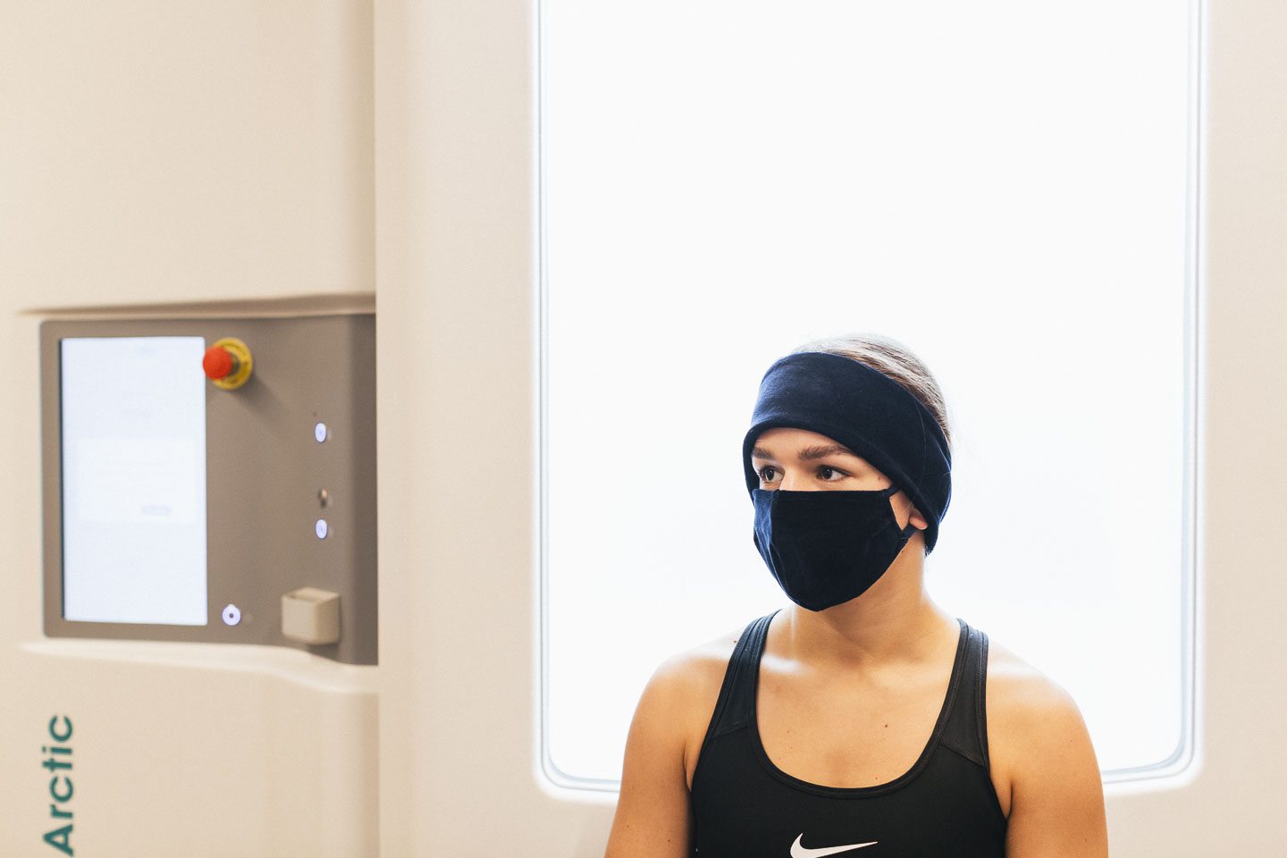 Athlete preparing for whole-body cryotherapy at Performe Sports Medicine